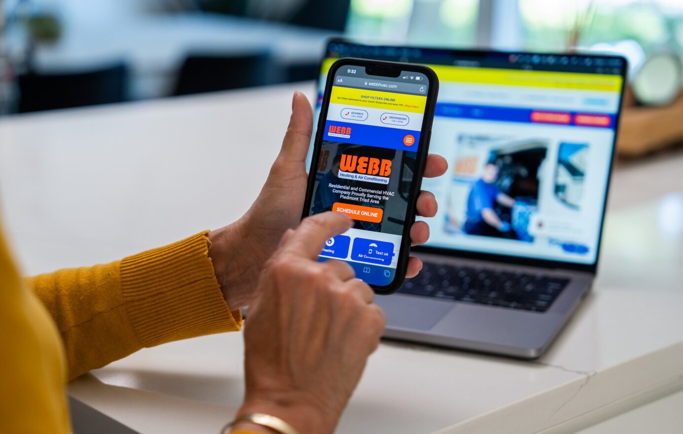 customer looking at the website maintenance plan through their phone